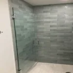 Heavy Shower Door Installation by Lemon Bay Glass