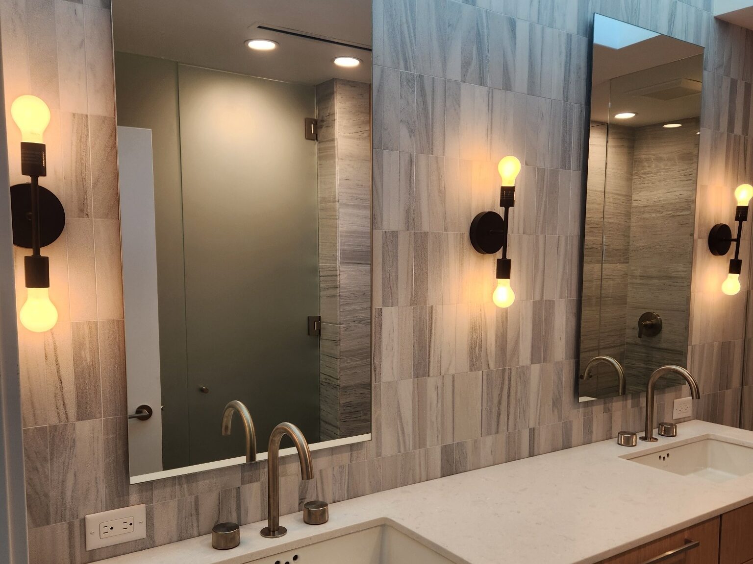 Modern Bathroom Mirrors installed by Lemon Bay Glass; ready for LED Lighting to be installed.