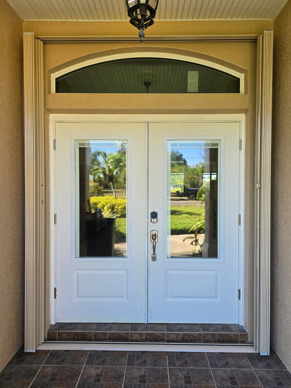 Hurricane-impact french doors installed by Lemon Bay Glass Englewood FL