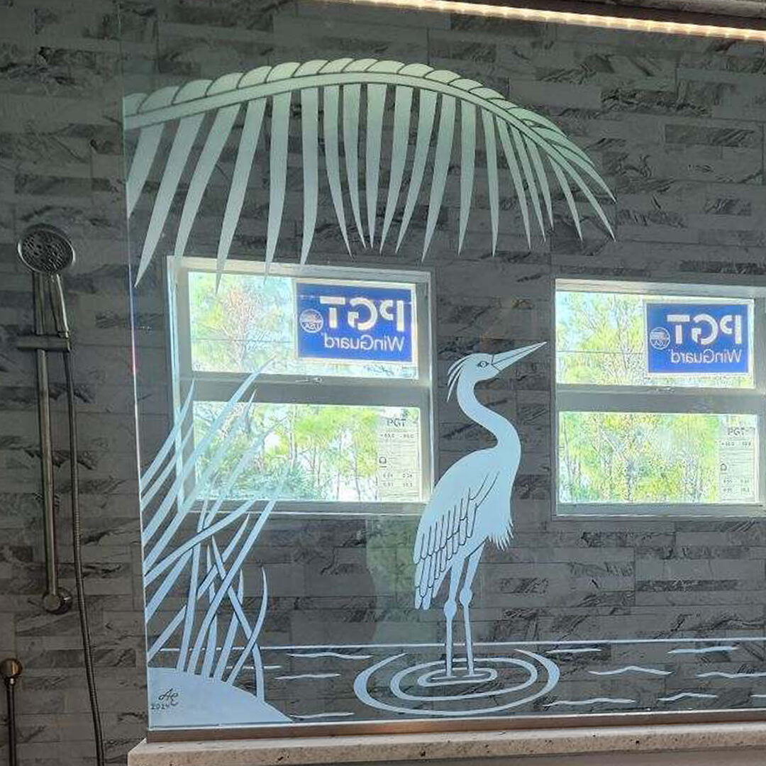 Custom etched glass for shower panel installed by Lemon Bay Glass Englewood FL.   